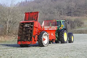 Spreading Prints: Contractor with John Deere 6520 tractor and K-two Duo muckspeader spreading farmyard manure