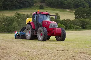 Agriculture Prints: Contractor with McCormick MC120 tractor and ERTH Agriseeder precision slot seeder