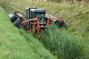 Dyke Prints: Countryside management, Berkenheger reed cutting machine working in dyke
