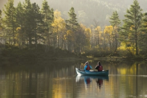Canoe Prints: Couple canoeing on freshwater loch