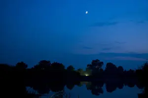 Traps Prints: Crescent Moon, above mercury vapour moth trap in beside flooded former gravel pit habitat at night
