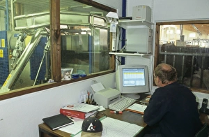 Office Prints: Dairy farming, farmer sitting at desk in office