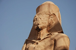 Sculptures Prints: Defaced statue of Pharaoh Ramesses II, Karnak Temple Complex, Egypt, january