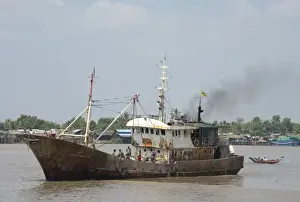 Ship Prints: Dilapadated old ship on river, Yangon, Myanmar, March