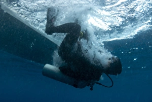 Dive Prints: Diver entering water from boat