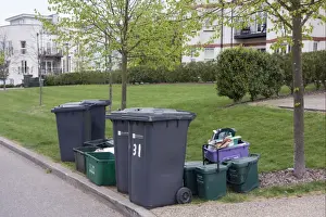 Estates Prints: Domestic refuse and recycling, waiting for collection on housing estate