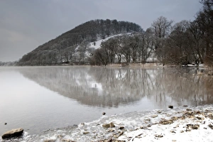 Early morning mist on upland lake, Ullswater, Lake District, Cumbria, England, december