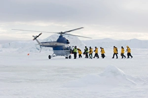 Helicopter Prints: Eco-tourists boarding helicopter