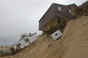 Flood Prints: Eroded sea cliffs and damaged chalets after December 2013 tidal surge