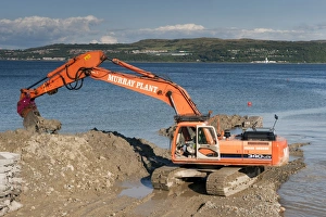 Environmental Prints: Excavator building sea defences, Dunoon, Firth of Clyde, Argyll and Bute, Scotland, august