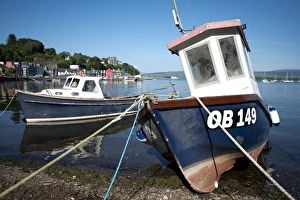 Seafronts Prints: Fishing boats moored on beach at harbour of coastal town