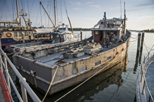 Fishing boats moored at coastal port, Lakes Entrance, Victoria, Australia, February