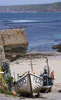 Sennen Prints: Fishing boats moored at harbour in coastal village