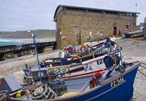 Lifeboats Prints: Fishing boats and RNLI lifeboat station