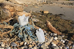 Pollution Prints: Fishing rubbish on beach at low tide, Bembridge, Isle of Wight, England, june