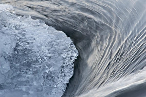 Ices Prints: Flowing water and ice on partially frozen river