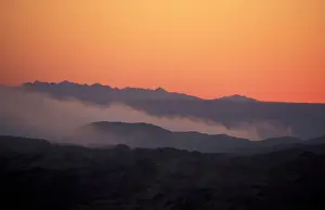Fogs Prints: Fog Early morning light on low lying fog near the coast of Swakopmund, Namibia