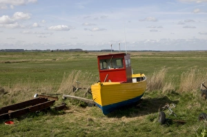 Freshly painted fishing boat on shore, Aldeburgh, Suffolk, England, april