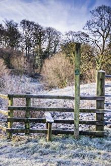Fence Prints: Frost on wooden fence with stile and Public Footpath sign