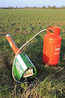 Protects Prints: Gas-gun, gas powered bird scarer at edge of arable field, Bacton, Suffolk, England, march