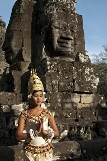 Girl dancer wearing Apsara (dancer) costume in Khmer temple, Bayon, Angkor Thom, Siem Riep, Cambodia