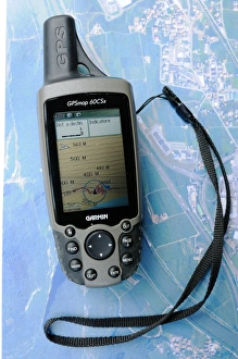 Equipment Prints: GPS device over satellite image, Italy, april