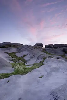 Gritstone rocks at twilight, Almscliff Crag rock formation, North Rigton, North Yorkshire, England, august