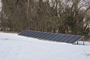 Solar Prints: Ground mounted solar panels in winter snow