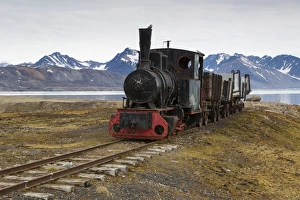 Track Prints: Historic coal mining stream train in tundra, Ny-Alesund, Spitsbergen, Svalbard, August