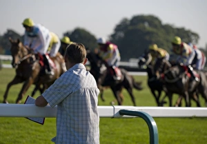 Equids Prints: Horse racing, punter leaning on rail at racecourse