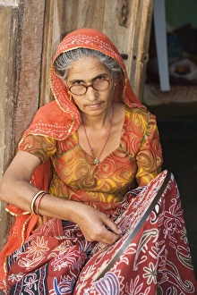 Subcontinent Prints: Indian woman with embroidery, Rajasthan, India, December