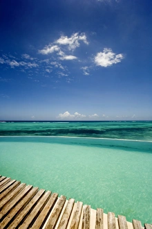 Holidays Prints: Infinity pool and sea, Shooting Star Lodge, Zanzibar, Tanzania