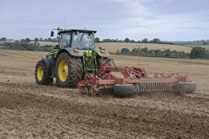 John Deere 7930 tractor with Vaderstad disc cultivator, cultivating arable field, Bridgnorth, Shropshire, England