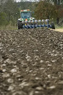 Furrows Prints: John Deere 8400 tractor pulling eight furrow reversible plough