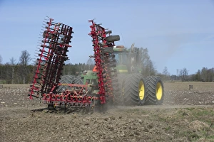 Cultivating Prints: John Deere 9400 tractor with harrows, harrowing arable field, Tierp, Uppsala, Sweden, may