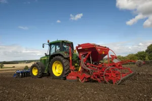 S Eed Prints: John Deere tractor with front press and rear seed drill