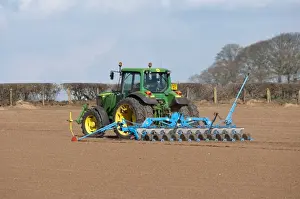 S Eed Prints: John Deere tractor with seed drill