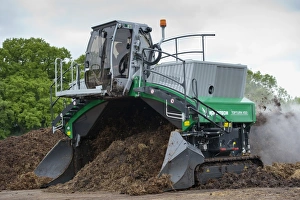 Site Prints: Komptech self-propelled compost turner, turning over rotting bedding manure, England, June
