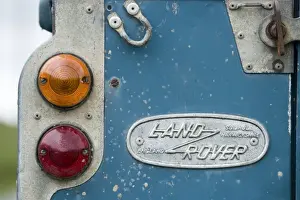 Cars Prints: Land Rover, close-up of badge and rear lights of farm vehicle, Warwickshire, England, may