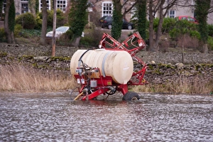 Flood Prints: Lely crop sprayer in floodwater, West Burton, North Yorkshire, England, January