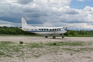 Planes Prints: Light aeroplane on runway, Okavango Delta, Botswana