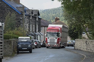 Transports Prints: Livestock lorry travelling through town on way to market