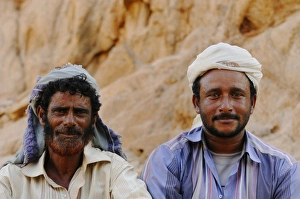 Local Prints: Two local men, close-up of heads, Socotra, Yemen, march