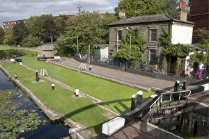 Pollution Prints: Lockgates with canal covered in green algae
