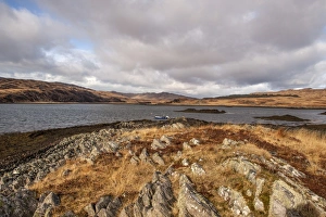 Low tide close to the landing stage at Loch Tarbet, the narrowest point on the Isle of Jura, Scotland