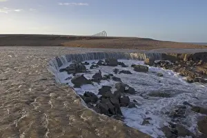 Flood Prints: Major breach in shingle defence sea wall after December 2013 tidal surge