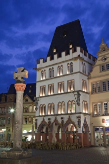 Germany Prints: Market cross and restaurant illuminated at night