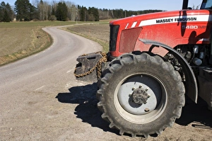 Driving Prints: Massey Ferguson 5480 tractor, pulling out onto rural road, Sweden, spring