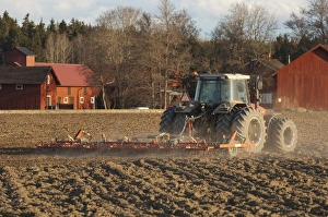 Prepare Prints: Massey Fergusson 6290 tractor with harrows, harrowing field seedbed, Sweden, may