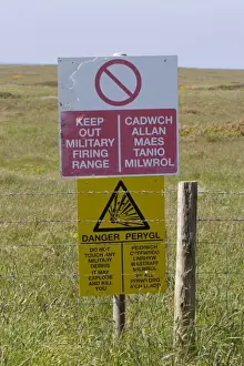 Dangerous Prints: Keep Out Military Firing Range and Danger bilingual signs at coastal military firing range